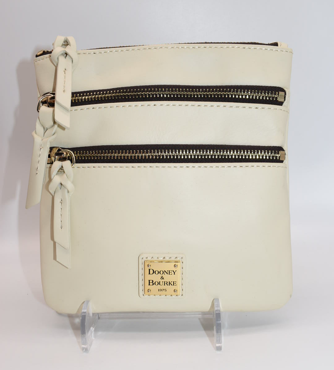 Dooney & Bourke Triple Zip Crossbody Bag in Cream