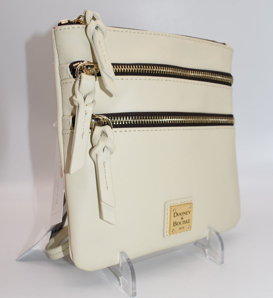 Dooney & Bourke Triple Zip Crossbody Bag in Cream