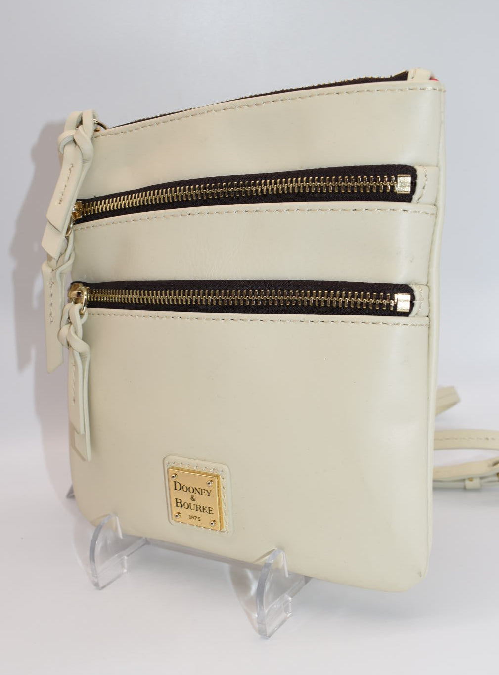 Dooney & Bourke Triple Zip Crossbody Bag in Cream