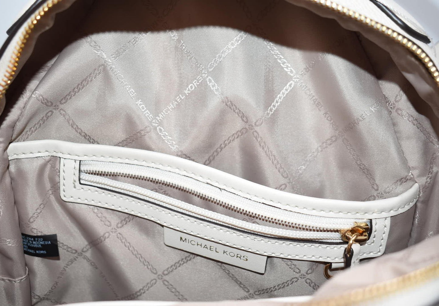 Michael Kors Valerie Medium Pebbled Leather Backpack in Light Cream