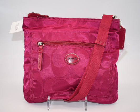 Coach Signature File Crossbody Bag in Fuchsia