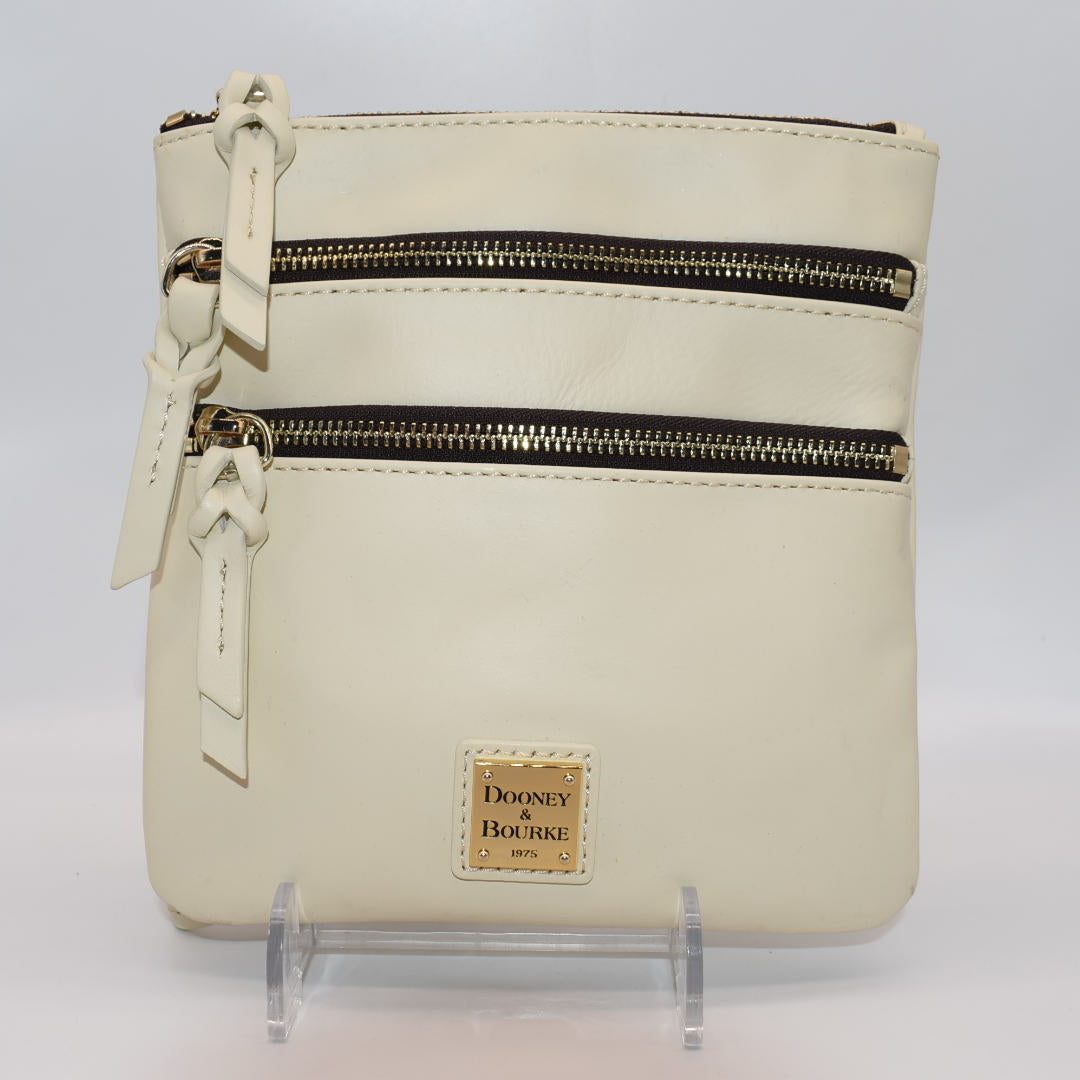 Dooney & Bourke Triple Zip Crossbody Bag in Cream