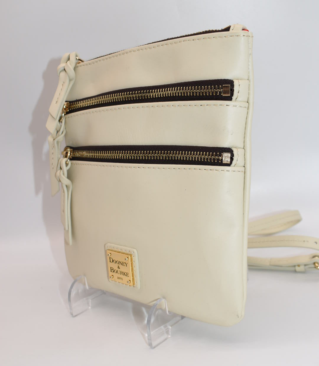 Dooney & Bourke Triple Zip Crossbody Bag in Cream